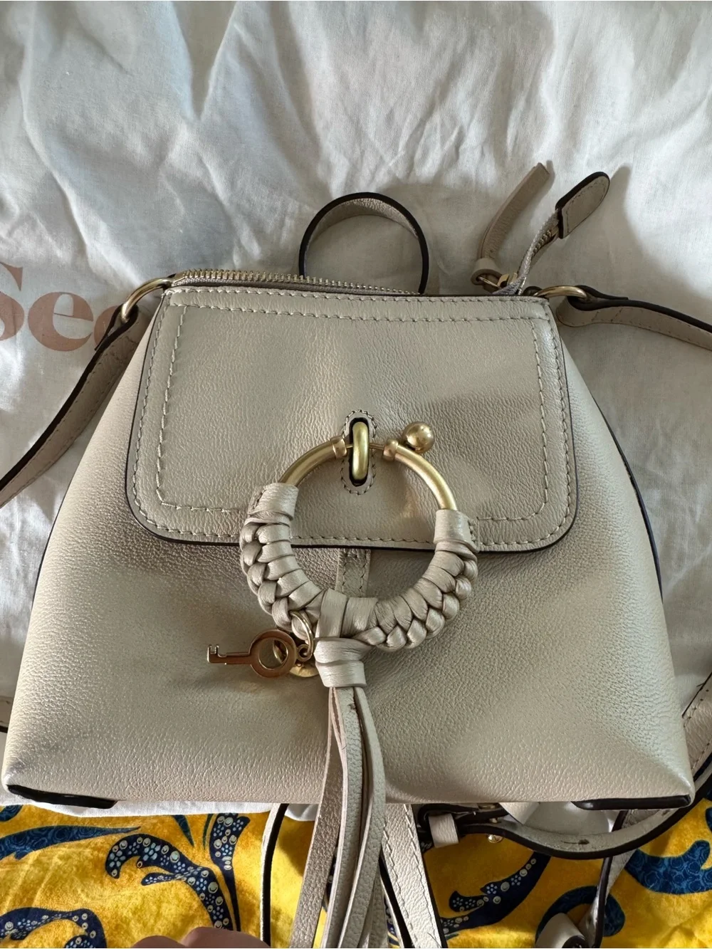 Chloe designer Cream Leather Crossbody Bag with Gold Ring Detail